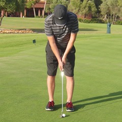 View from face on, putter shaft vertical